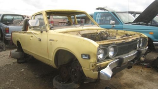 Another Datsun King Cab Doomed, Lack Of Cup Holders Probably To Blame